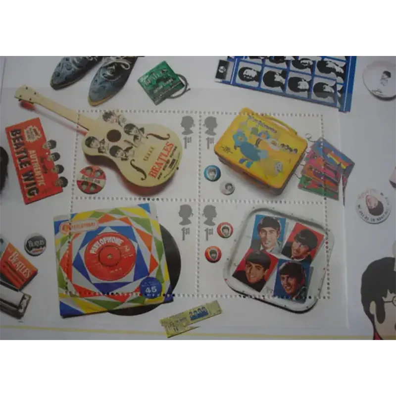 Sheet of 4 Beatles stamps (close-up)