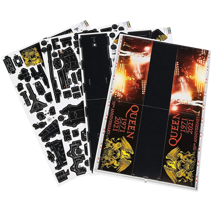 Sheet of separate pieces from the Queen 3D puzzle – truck visual with Freddie Mercury and Queen 50th Anniversary gold motifs